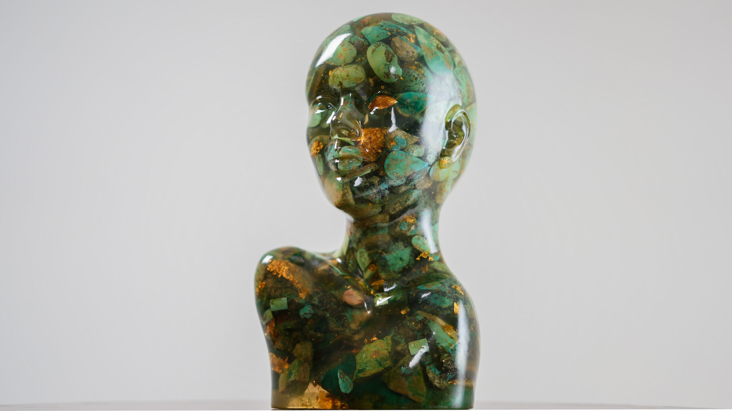 Parvaz sculpture from the Metamorphosis series made with turquoise, gold, and resin by Arzhang Mahajan and Mehraneh Jafari