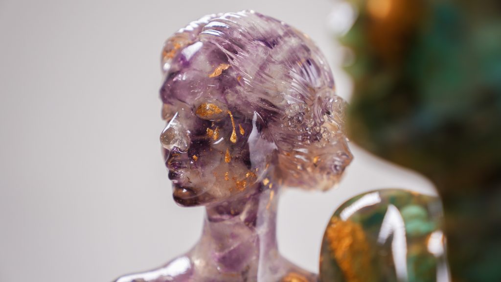 Azad sculpture from the Metamorphosis Series by Mehrang Art Studio, made with stone, resin, precious minerals, and gold.