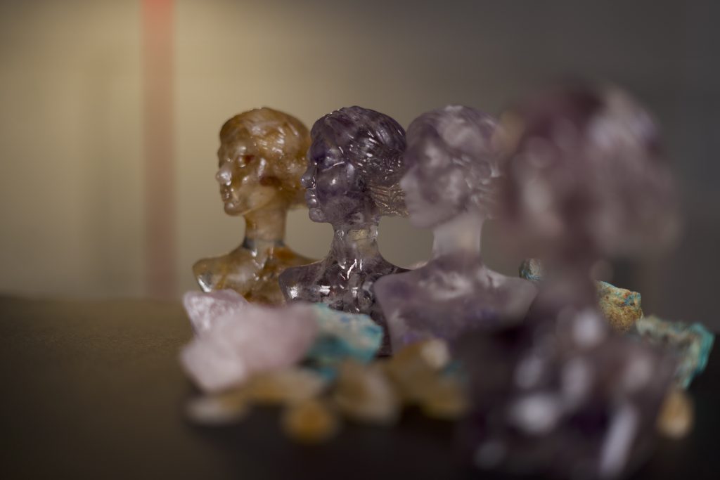 Detail view of a sculpture from the Metamorphosis Series by Arzhang Mahajan and Mehraneh Jafari, combining stone, resin, minerals, and gold.